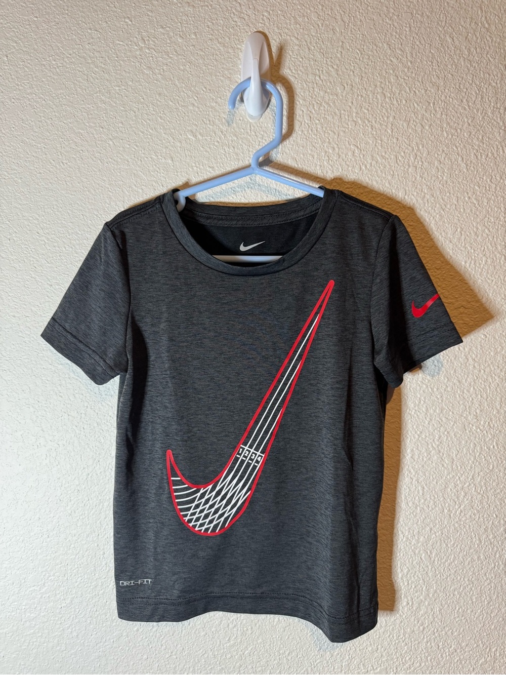 Nike Kids' Dark Gray Short Sleeve Dri-FIT Tee with Red Swoosh